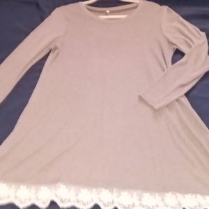 Gray dress with white trim on the bottom